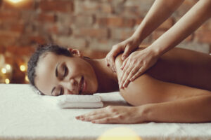 African American Woman Receiving Relaxing Massage Spa 1