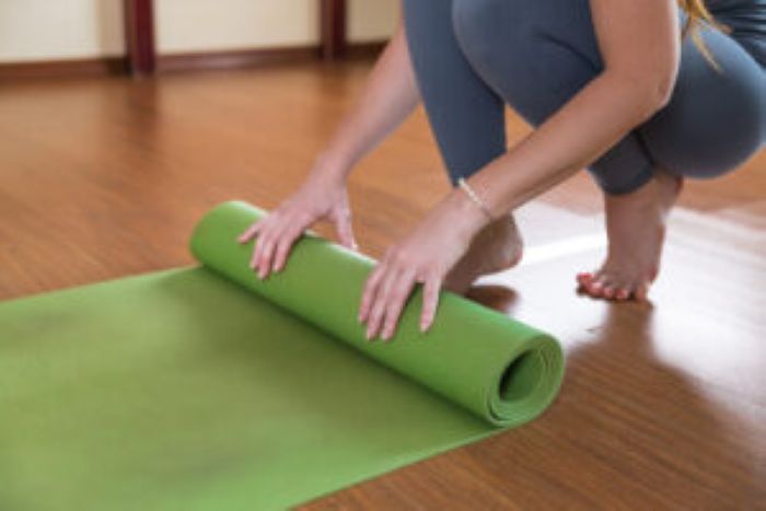 Unrecognizable Woman Roll Up Green Mat Workout Slim Girl Sportswear Finish Doing Yoga Fitness 300X200 1
