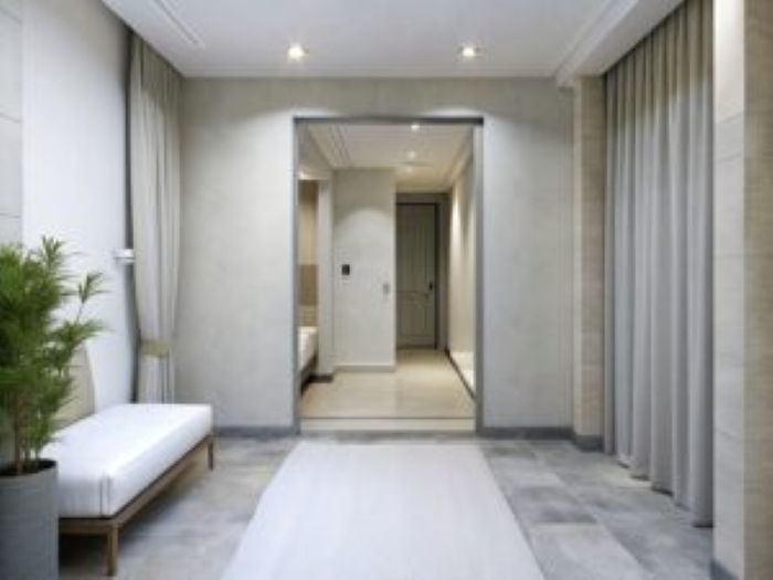 Room With Bed Door That Says Exit 300X225 1