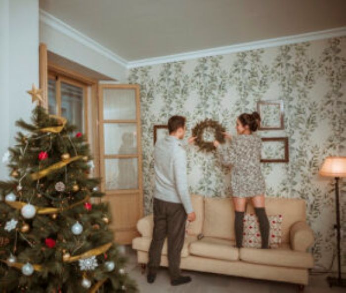 Couple Decorating Room Christmas 1 300X254 1