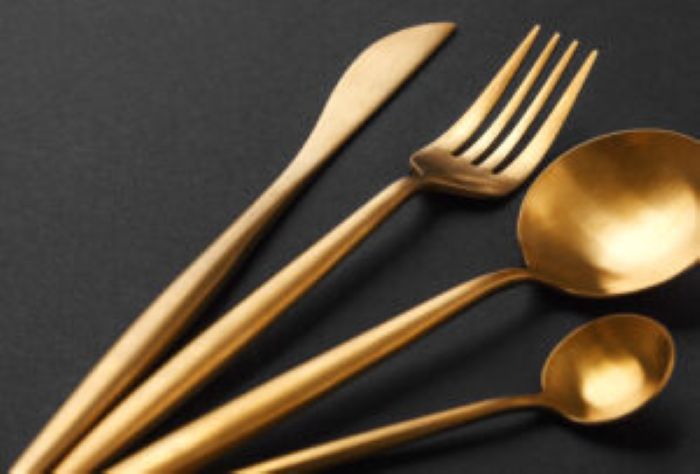 Gold Cutlery Set Black Background 300X203 1
