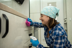 Young Woman Rubber Gloves Holds Rag Surface Cleaner Kitchen Cleans Room From Dirt Concept Cleanliness Order Kitchen Maid