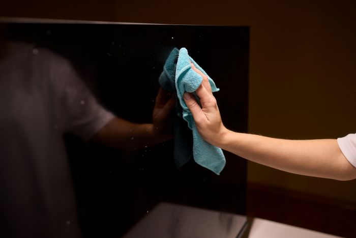 Effective Safe Cleaning Techniques Curved Television Screen Using Microfiber Cloth