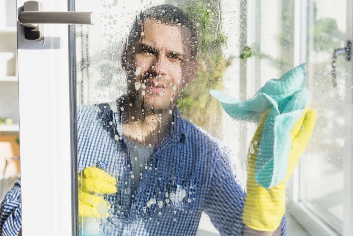 Man Cleaning His Home