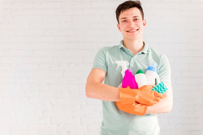 Portrait Man Cleaning His House