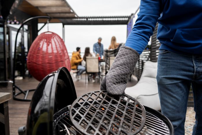 Man Preparing Barbeque Cooking