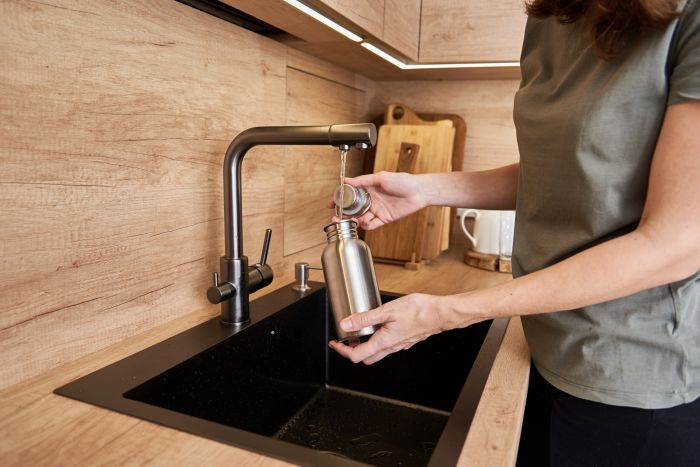 Woman Pouring Water Metal Eco Friendly Bottle Zero Waste Concept 2