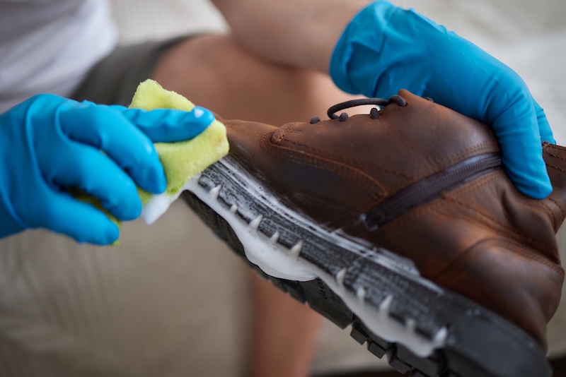 Applying Cleaning Foam From Bottle White Leather Womens Sneakers Care Leather Shoes Surface Whitening