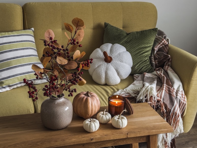 Cozy Home Interior Autumn Decor Candles Wooden Table Near Sofa With Pillows Blanket Autumn Is Cozy Season