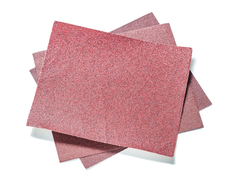 Three Red Sheet Abrasive Paper Isolated White
