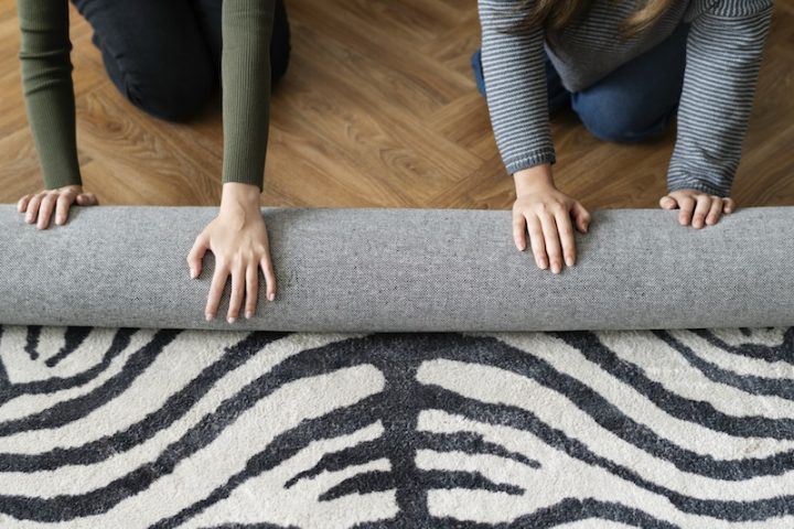 friends rolling carpet