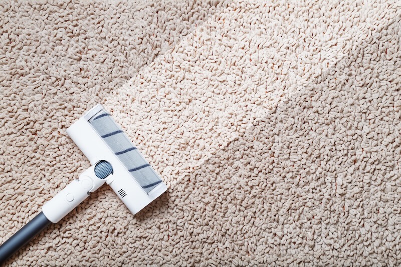 Human Legs White Turbo Brush Cordless Vacuum Cleaner Cleans Carpet House Modern Technologies Cleaning
